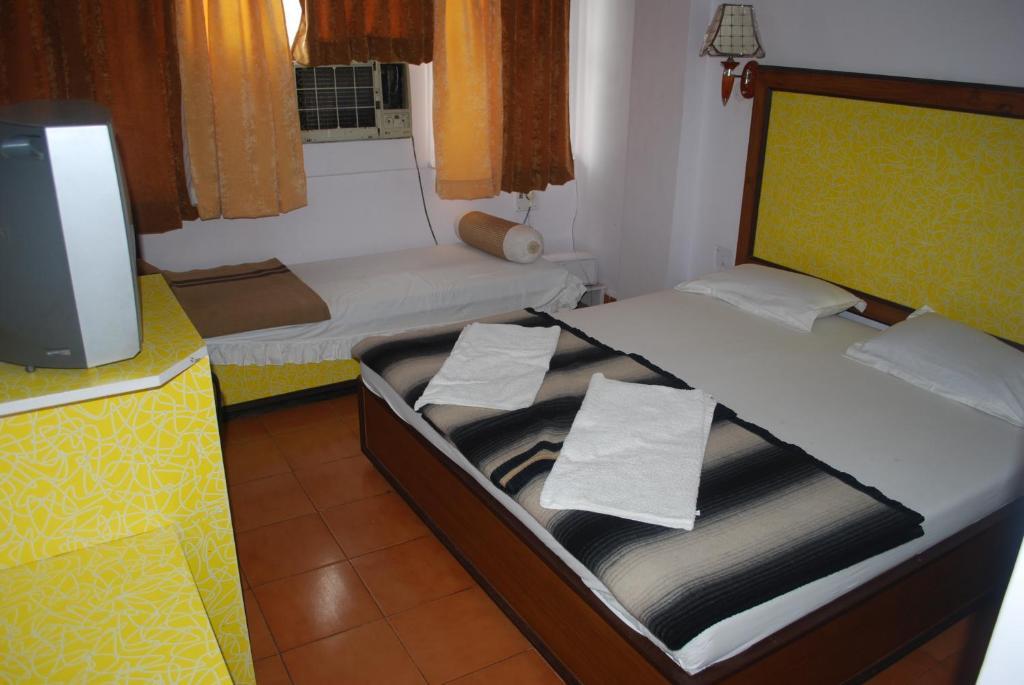 לקנאו Charans Guest House חדר תמונה