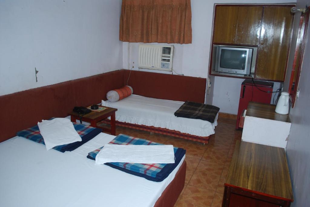 לקנאו Charans Guest House חדר תמונה